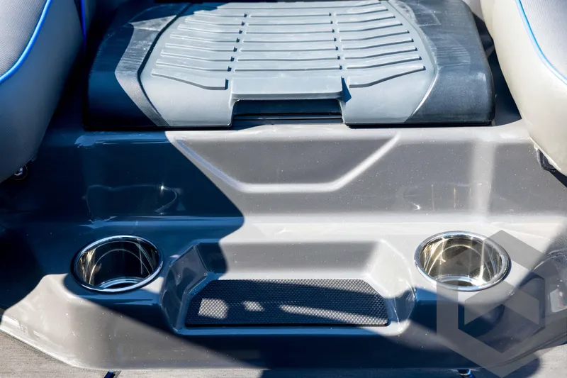 Slide: The Image of 2026 Skeeter FXR21 Apex boat interior with cup holders and seating area. - 67