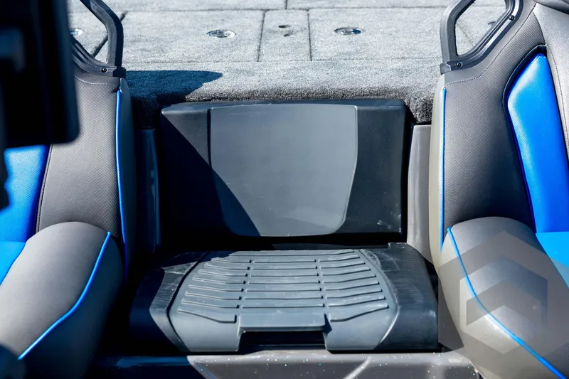 Slide: The Image of 2026 Skeeter FXR21 Apex boat interior with blue and black seating. - 68