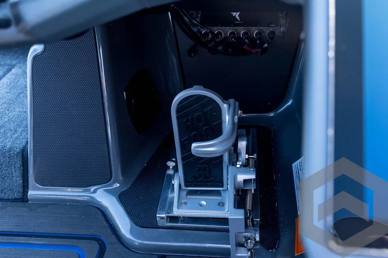 Slide: The Image of 2026 Skeeter FXR21 Apex boat foot pedal and control panel detail. - 74