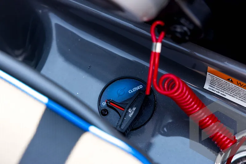 Slide: The Image of 2026 Skeeter FXR21 Apex boat ignition switch with red safety cord. - 78