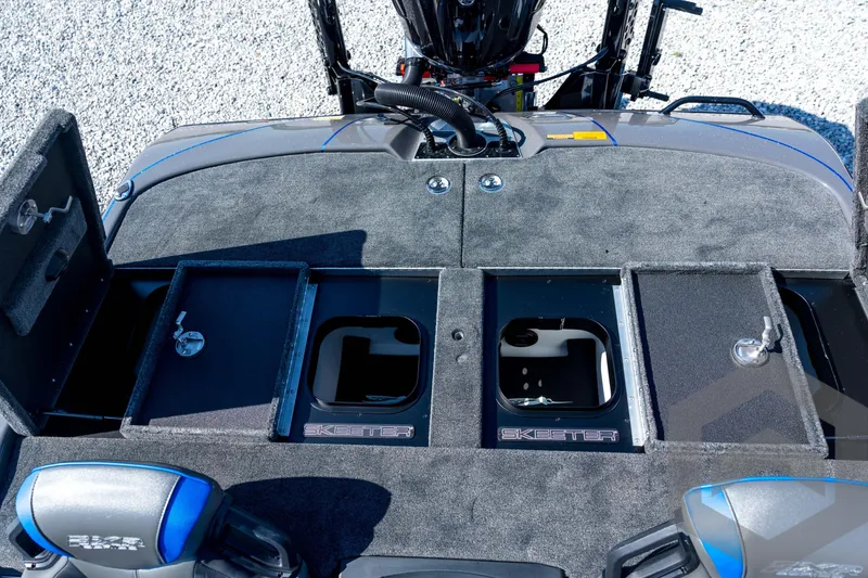 Slide: The Image of 2026 Skeeter FXR21 Apex boat interior with storage compartments and seating. - 82