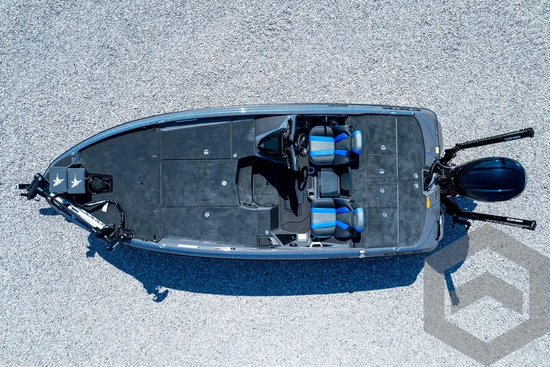 Slide: The Image of 2026 Skeeter FXR21 Apex boat, aerial view, featuring dual seats and sleek design. - 92