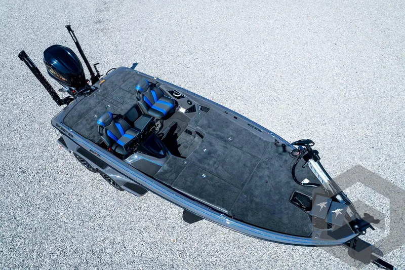 Slide: The Image of 2026 Skeeter FXR21 Apex boat, aerial view, featuring dual seats and sleek design. - 98