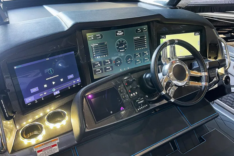 Slide: The Image of Dashboard of 2022 MTI V50 with advanced digital displays and steering wheel. - 3