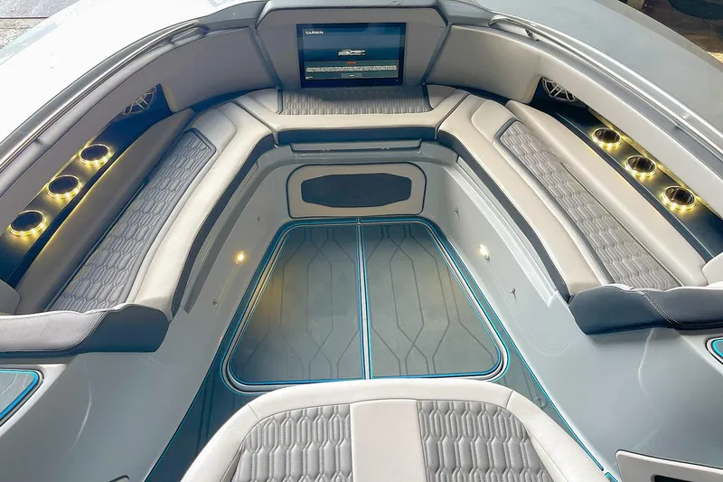 Slide: The Image of Luxurious interior of 2022 MTI V50 boat with elegant seating and ambient lighting. - 6