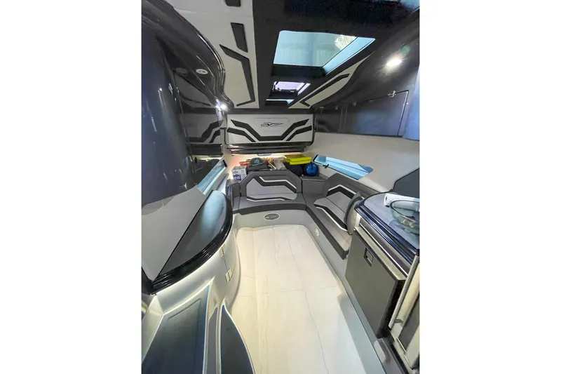 Slide: The Image of Interior of 2022 MTI V50 boat with modern design and seating area. - 7