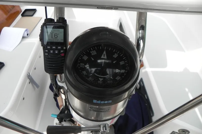 Slide: The Image of Cockpit of 1988 Tartan 40 sailboat with compass and marine radio. - 15