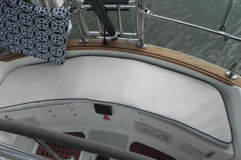 Slide: The Image of Cockpit seating area on a 1988 Tartan 40 sailboat with patterned cushion. - 36