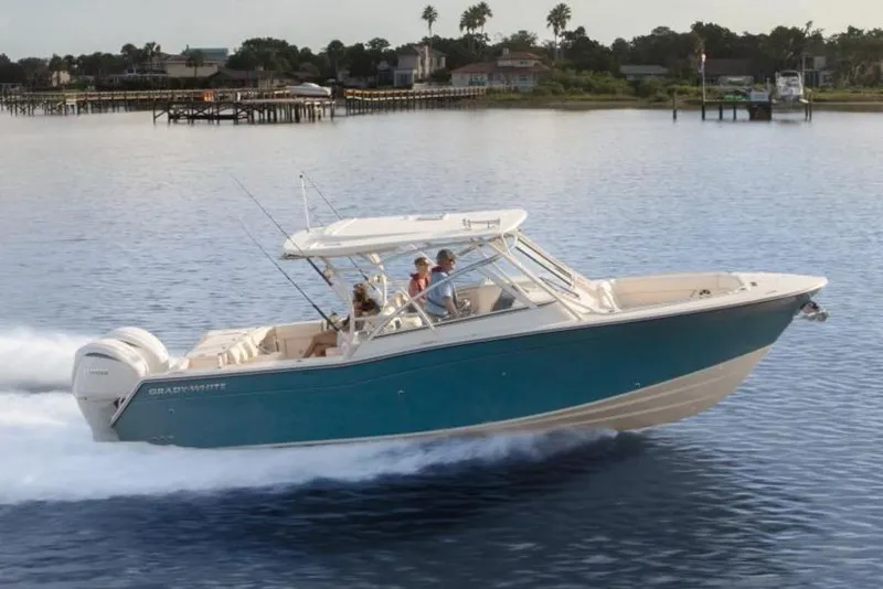 The Image of 2026 Grady-White Freedom 307 boat cruising on calm waters. - 2