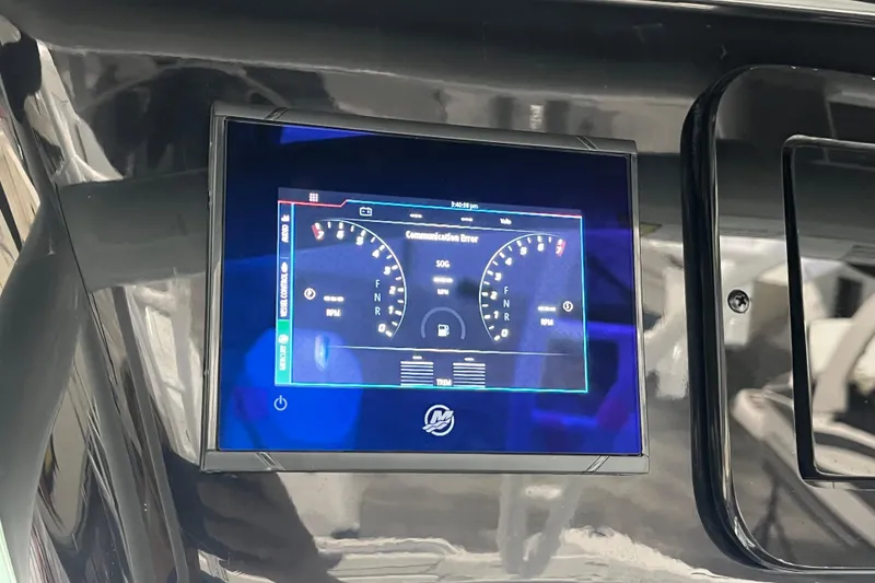 Slide: The Image of Touchscreen display on 2026 Wellcraft 302 Fisherman boat showing engine diagnostics. - 21