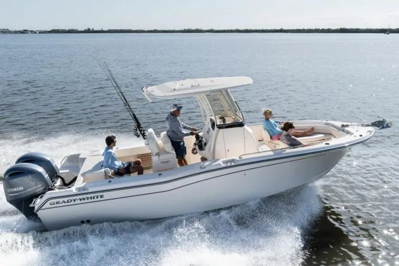 The Image of 2026 Grady-White Fisherman 257 boat cruising on open water with passengers. - 5