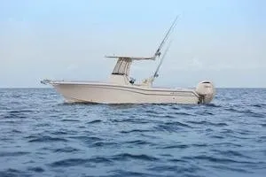 Slide: The Image of 2026 Grady-White Fisherman 257 boat on open sea, side view. - 6