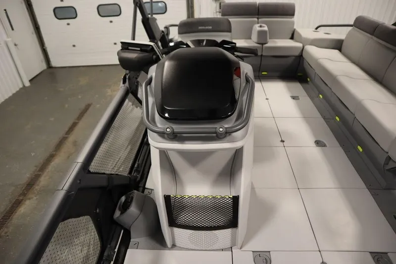 Slide: The Image of 2024 Sea-Doo Switch® 21 Sport/Cruise interior with seating and helm controls. - 11