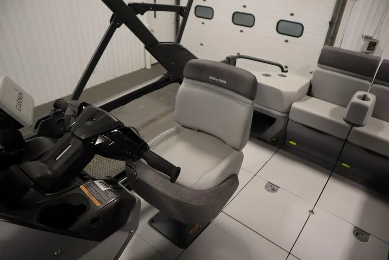 Slide: The Image of 2024 Sea-Doo Switch® 21 Sport/Cruise interior with seating and controls. - 28