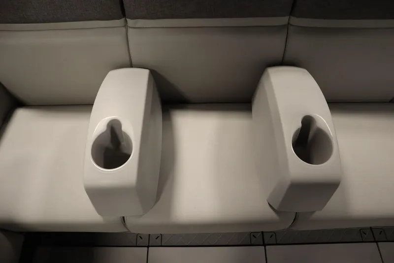 Slide: The Image of 2024 Sea-Doo Switch® 21 Sport/Cruise boat seating with integrated cup holders. - 36