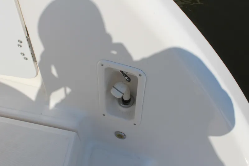 Slide: The Image of 2008 Tiara Yachts 3500 Sovran deck detail with shadow and water inlet. - 13