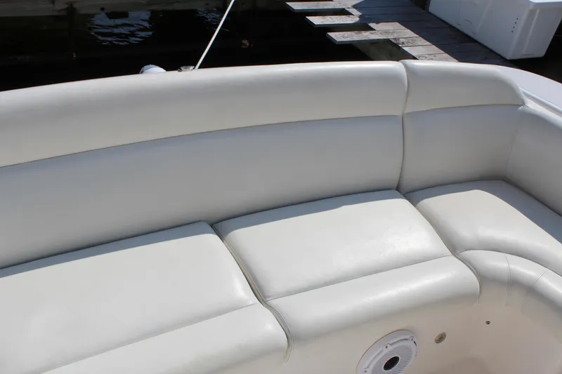 Slide: The Image of 2008 Tiara Yachts 3500 Sovran, white leather seating detail, dockside view. - 15