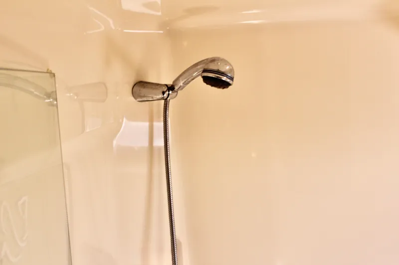 Slide: The Image of Shower area in 2008 Tiara Yachts 3500 Sovran, featuring chrome handheld showerhead. - 45