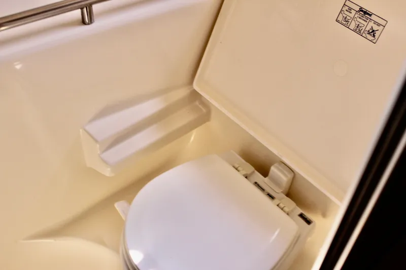 Slide: The Image of 2008 Tiara Yachts 3500 Sovran bathroom with compact marine toilet. - 46