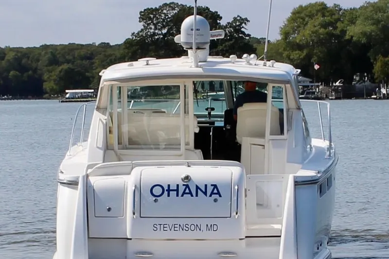 Slide: The Image of 2008 Tiara Yachts 3500 Sovran on water, rear view, labeled "OHANA," Stevenson, MD. - 9