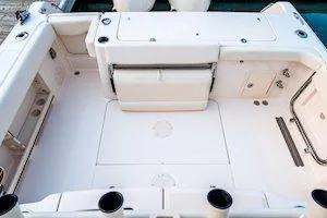 Slide: The Image of 2026 Grady-White Canyon 306 boat deck, spacious and well-equipped for fishing. - 8