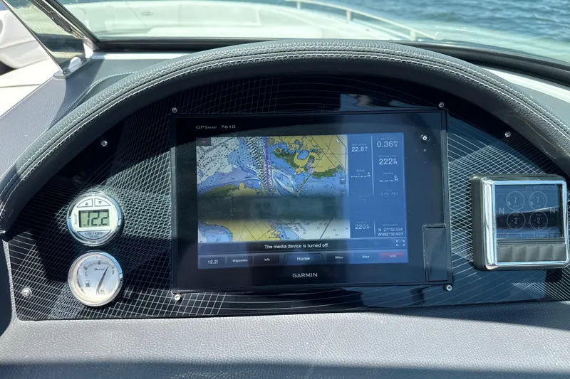 Slide: The Image of Dashboard of 2017 Regal 29 OBX boat with Garmin GPS display. - 28
