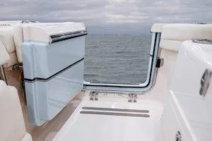 Slide: The Image of Control panel of 2026 Grady-White Canyon 271 boat with advanced navigation features. - 14