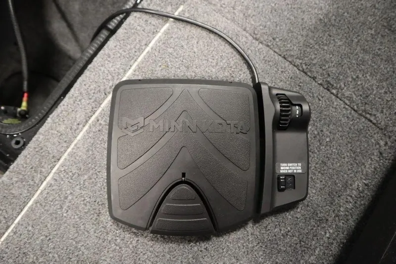 Slide: The Image of Foot pedal control on 2023 Tracker Pro Guide V-16 WT boat, featuring Minn Kota branding. - 17