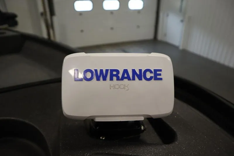 Slide: The Image of Lowrance Hook device on 2023 Tracker Pro Guide V-16 WT boat dashboard. - 25
