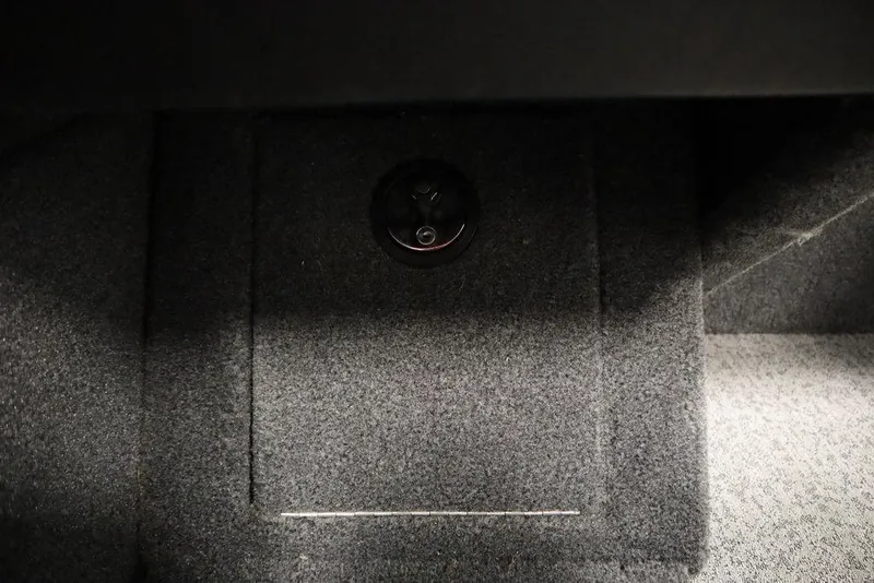 Slide: The Image of Carpeted storage compartment in 2023 Tracker Pro Guide V-16 WT boat. - 36