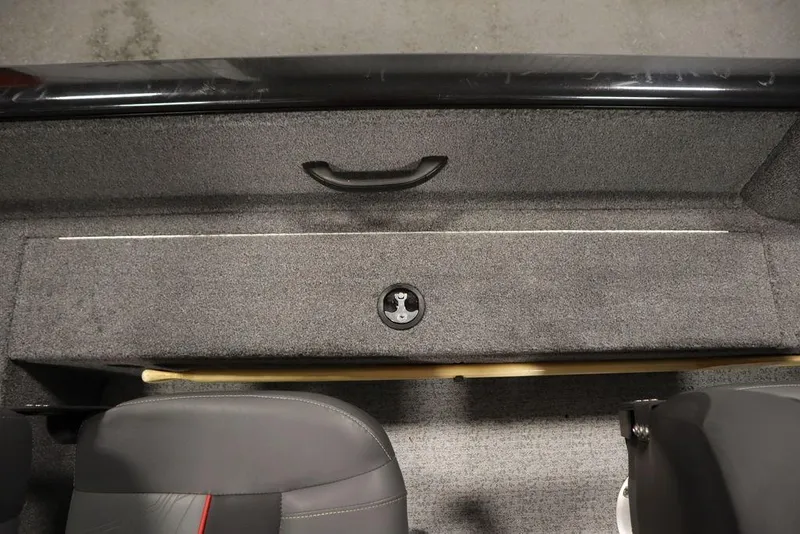 Slide: The Image of 2023 Tracker Pro Guide V-16 WT interior with gray carpet and seating. - 40