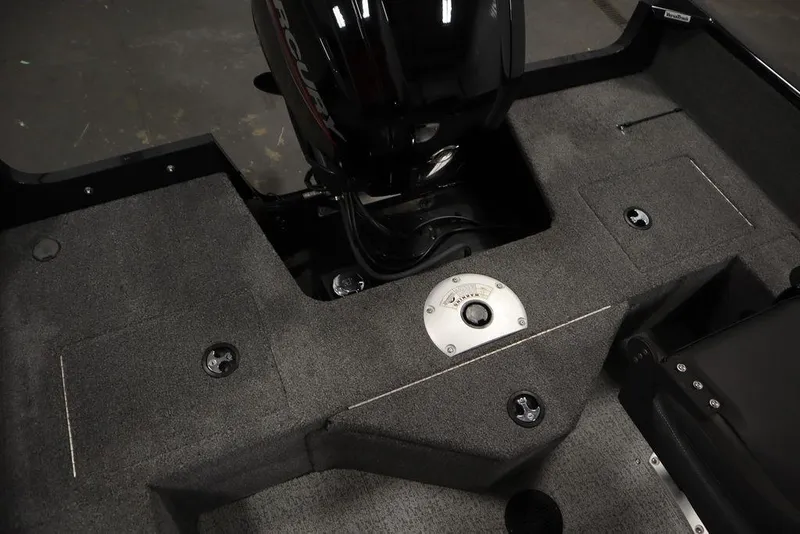 Slide: The Image of 2023 Tracker Pro Guide V-16 WT boat interior with Mercury engine and storage compartments. - 45