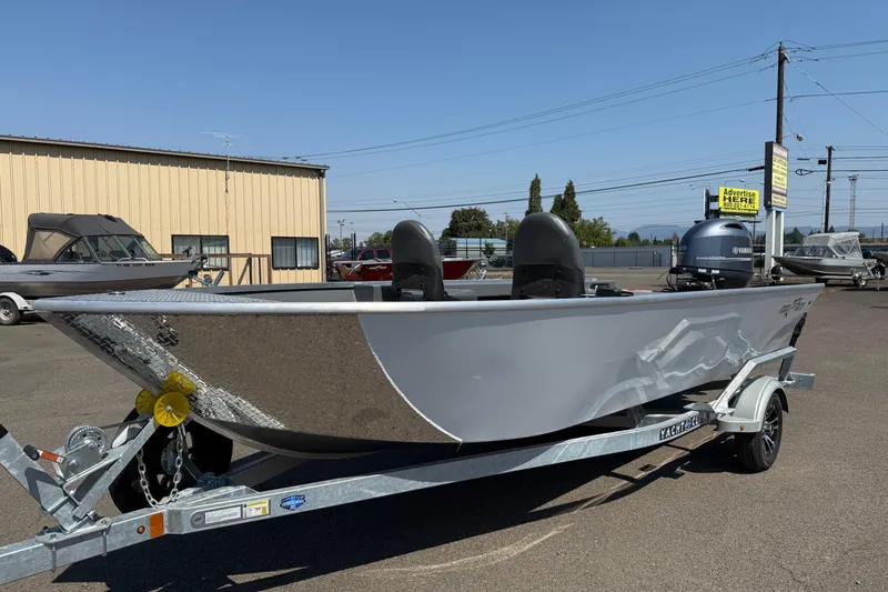 The Image of 2026 Fish Rite Angler 18 boat on trailer in outdoor lot. - 0