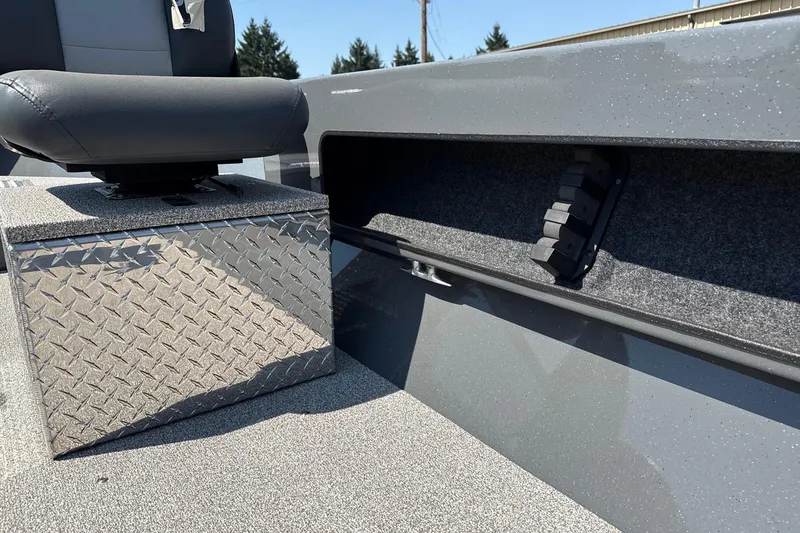 Slide: The Image of 2026 Fish Rite Angler 18 interior with seat and storage compartment. - 10