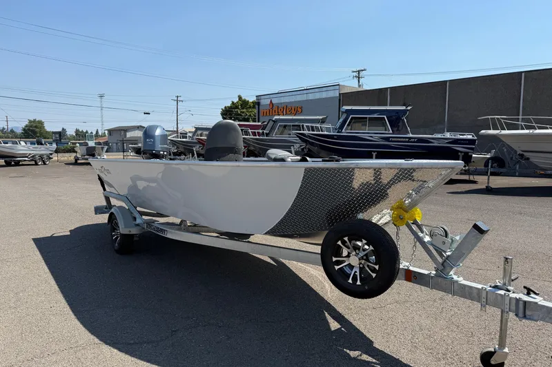Slide: The Image of 2026 Fish Rite Angler 18 boat on trailer in outdoor dealership lot. - 5