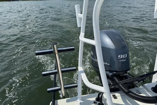 Slide: The Image of 2024 Beavertail Skiffs Vengeance with Yamaha 90 engine on water. - 15