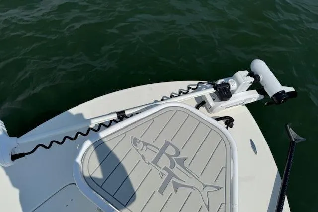 Slide: The Image of 2024 Beavertail Skiffs Vengeance boat deck with logo, featuring a mounted trolling motor. - 17