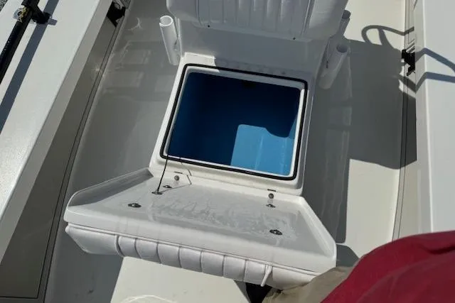 Slide: The Image of 2024 Beavertail Skiffs Vengeance boat seat with open storage compartment. - 20