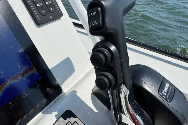 Slide: The Image of 2024 Beavertail Skiffs Vengeance boat controls with Yamaha throttle and navigation display. - 23