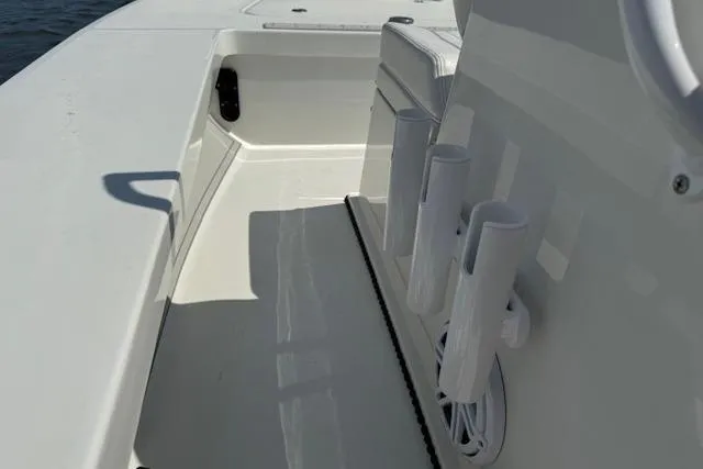 Slide: The Image of 2024 Beavertail Skiffs Vengeance interior with rod holders and seating. - 8