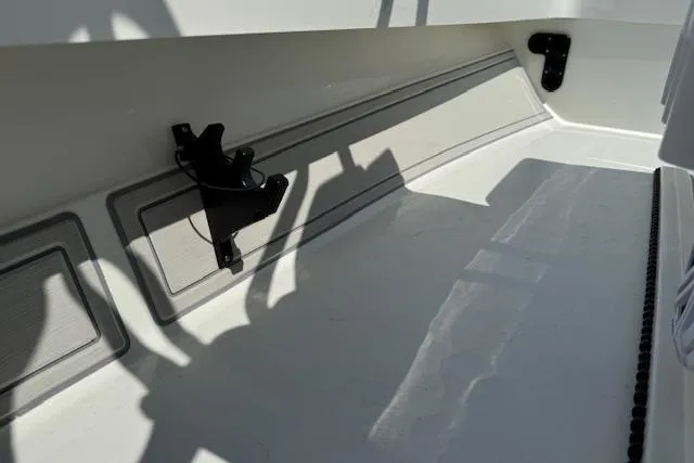 Slide: The Image of 2024 Beavertail Skiffs Vengeance interior detail with mounted accessories and sleek design. - 9