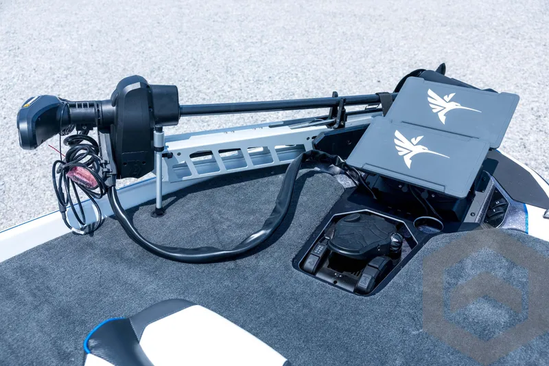 Slide: The Image of 2026 Skeeter FXR21 FLEX boat deck with advanced trolling motor and control panels. - 11