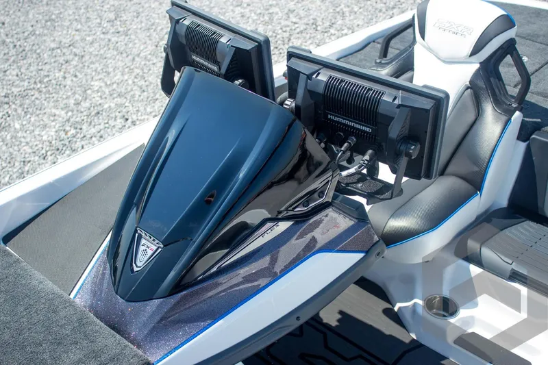 Slide: The Image of 2026 Skeeter FXR21 FLEX boat dashboard with dual Humminbird displays and sleek seating. - 35