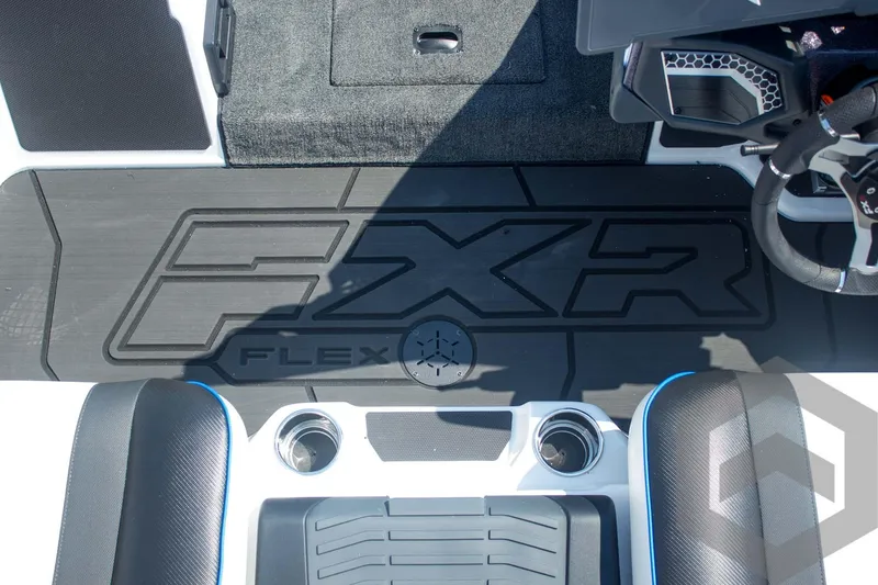 Slide: The Image of 2026 Skeeter FXR21 FLEX boat interior with logo and steering wheel detail. - 38