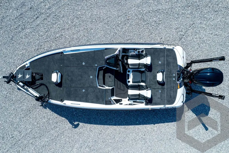 Slide: The Image of 2026 Skeeter FXR21 FLEX boat, aerial view, on gravel surface. - 45