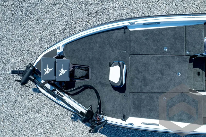 Slide: The Image of 2026 Skeeter FXR21 FLEX boat deck with advanced fishing equipment and seating. - 46