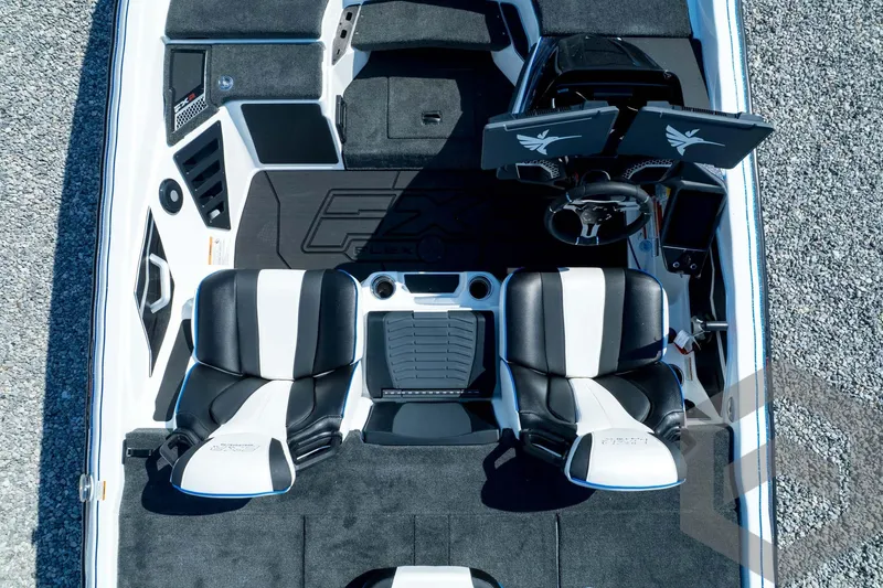 Slide: The Image of 2026 Skeeter FXR21 FLEX boat interior with dual seats and modern dashboard. - 47