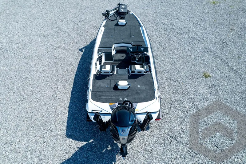 Slide: The Image of 2026 Skeeter FXR21 FLEX boat on gravel, aerial view. - 53