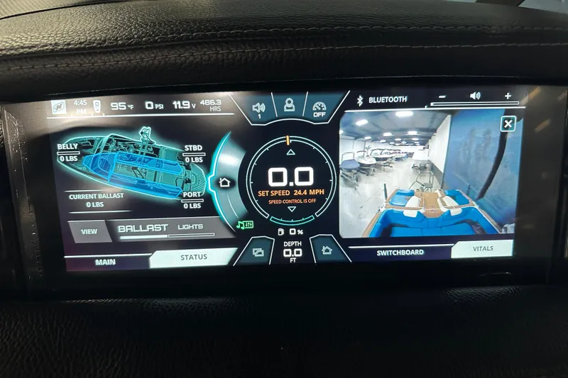 Slide: The Image of 2018 Nautique Super Air Nautique GS24 dashboard display showing ballast and speed settings. - 17