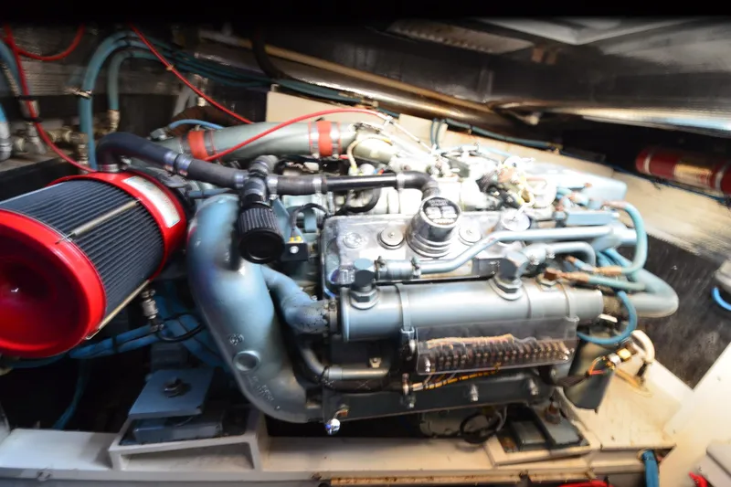 Slide: The Image of Engine of a 1991 Baron 43-E, featuring complex piping and components. - 31